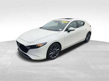 2024 Mazda Mazda3 2.5 S in a Snowflake White Pearl Mica exterior color and Blackinterior. BEACH BLVD OF CARS beachblvdofcars.com 