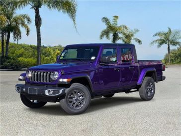 New 2026 Jeep Gladiator Sport S 4x4 in a Reign exterior color and Blackinterior. Southbay Chrysler Jeep Dodge Ram (424) 404-5521 pixelmotiondemo.com 