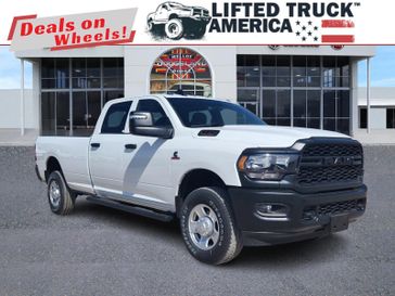 2024 RAM 2500 Tradesman in a Bright White Clear Coat exterior color and Blackinterior. Lifted Truck America 888-267-0644 liftedtruckamerica.com 