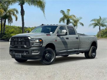 New 2026 RAM 3500 Tradesman Crew Cab 4x4 8' Box in a Ceramic Gray Clear Coat exterior color and Blackinterior. Southbay Chrysler Jeep Dodge Ram (424) 404-5521 pixelmotiondemo.com 