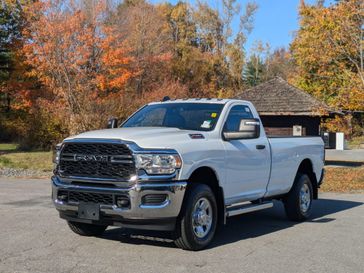 2024 RAM 2500 Tradesman Regular Cab 4x4 8' Box in a Bright White Clear Coat exterior color and Diesel Gray/Blackinterior. Brattleboro CDJR 802-251-1111 brattleborocdjr.com 