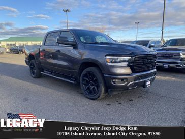 2024 RAM 1500 Laramie Crew Cab 4x4 5'7' Box in a Granite Crystal Metallic Clear Coat exterior color and Blackinterior. Legacy Chrysler Jeep Dodge RAM 541-663-4885 legacychryslerjeepdodgeram.com 