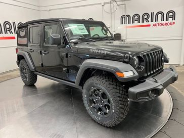 2023 Jeep Wrangler 4-door Willys 4x4 in a Black Clear Coat exterior color and Blackinterior. Marina Auto Group (855) 564-8688 marinaautogroup.com 