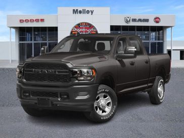 2024 RAM 2500 Tradesman in a Granite Crystal Metallic Clear Coat exterior color and Diesel Gray/Blackinterior. Lifted Truck America 888-267-0644 liftedtruckamerica.com 