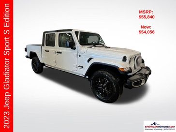 2023 Jeep Gladiator Sport S 4x4 in a Bright White Clear Coat exterior color and Blackinterior. Sheridan Motors Auto (307) 218-2217 sheridanmotors.com 