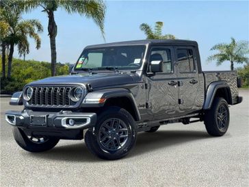 New 2026 Jeep Gladiator Sport S 4x4 in a Granite Crystal Metallic Clear Coat exterior color and Blackinterior. Southbay Chrysler Jeep Dodge Ram (424) 404-5521 pixelmotiondemo.com 