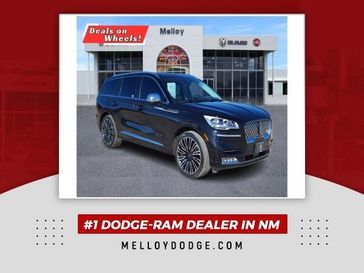 2022 Lincoln Aviator Black Label in a Black exterior color and Cashmereinterior. Melloy Dodge RAM FIAT 505-588-4459 melloydodge.com 