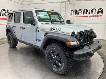 2023 Jeep Wrangler 4-door Willys 4x4 in a Silver Zynith Clear Coat exterior color and Blackinterior. Marina Auto Group (855) 564-8688 marinaautogroup.com 