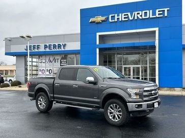 2015 Ford F-150 Lariat in a Magnetic Metallic exterior color and Blackinterior. Jeff Perry Chrysler Jeep 815-859-8394 jeffperrychryslerjeep.com 