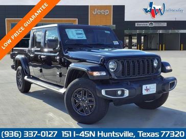 2024 Jeep Gladiator Sport S 4x4 in a Black Clear Coat exterior color and Blackinterior. Wischnewsky Dodge 936-755-5310 wischnewskydodge.com 