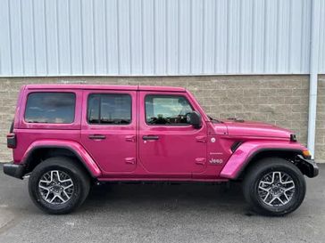 2024 Jeep Wrangler 4-door Sahara in a Limited Edition Tuscadero Pearl Coat exterior color and Blackinterior. Wilmington Auto Center Chrysler Dodge Jeep Ram (937) 556-6430 wilmingtonautocentercdjr.com 