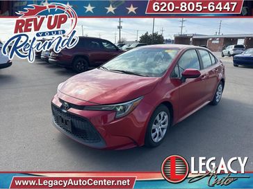 2021 Toyota Corolla LE in a Barcelona Red Metallic exterior color and Blackinterior. Legacy Auto Center 620-315-9264 legacyautocenter.net 