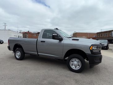 2024 RAM 2500 Tradesman Regular Cab 4x4 8' Box in a Billet Silver Metallic Clear Coat exterior color. Hometown Motors of Rockwell City 712-220-7644 hometownmotorsrc.com 