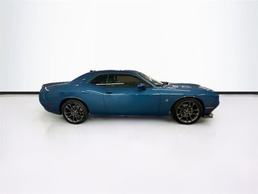 2023 Dodge Challenger R/T Scat Pack in a Frostbite exterior color and Blackinterior. Sheridan Motors Auto (307) 218-2217 sheridanmotors.com 