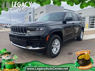 2025 Jeep Grand Cherokee L Laredo X 4x4 in a Diamond Black Crystal Pearl Coat exterior color and Blackinterior. Legacy Auto Center 620-315-9264 legacyautocenter.net 