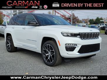 2024 Jeep Grand Cherokee Summit Reserve 4xe in a Bright White Clear Coat exterior color and Global Black - ECX7interior. Carman Chrysler Jeep Dodge Ram 302-317-2378 carmanchryslerjeepdodge.com 