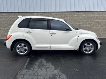 2002 Chrysler PT Cruiser Limited in a Stone White exterior color and Taupe/Pearl Beigeinterior. Wilmington Auto Center Chrysler Dodge Jeep Ram (937) 556-6430 wilmingtonautocentercdjr.com 