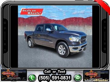 2023 RAM 1500 Laramie in a Granite Crystal Metallic Clear Coat exterior color and Blackinterior. Melloy Dodge RAM FIAT 505-588-4459 melloydodge.com 