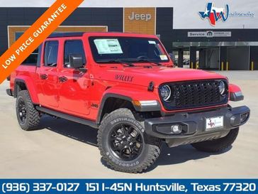 2024 Jeep Gladiator Willys 4x4 in a Firecracker Red Clear Coat exterior color. Wischnewsky Dodge 936-755-5310 wischnewskydodge.com 