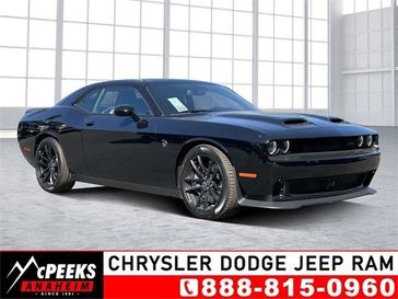 2023 Dodge Challenger Srt Hellcat Jailbreak in a Pitch-Black exterior color and Blackinterior. McPeek's Chrysler Dodge Jeep Ram of Anaheim 888-861-6929 mcpeeksdodgeanaheim.com 