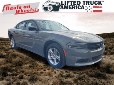 2023 Dodge Charger SXT in a Destroyer Gray Clear Coat exterior color and Blackinterior. Lifted Truck America 888-267-0644 liftedtruckamerica.com 