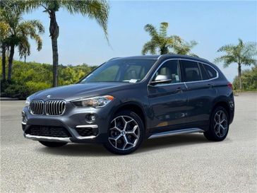 Used 2019 BMW X1 sDrive28i Sports Activity Vehicle in a Mineral Grey Metallic exterior color and Oyster/Blackinterior. Southbay Chrysler Jeep Dodge Ram (424) 404-5521 pixelmotiondemo.com 