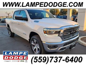 2024 RAM 1500 Laramie Crew Cab 4x4 5'7' Box in a Bright White Clear Coat exterior color and Blackinterior. Lampe Chrysler Dodge Jeep RAM 559-471-3085 pixelmotiondemo.com 