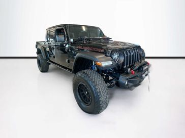 2021 Jeep Gladiator Rubicon in a Black Clear Coat exterior color and Blackinterior. Sheridan Motors CDJR 307-218-2217 sheridanmotor.com 
