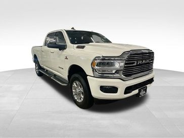 2024 RAM 2500 Laramie Crew Cab 4x4 6'4' Box in a Pearl White exterior color and Blackinterior. Sheridan Motors Auto (307) 218-2217 sheridanmotors.com 