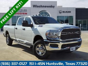 2024 RAM 2500 Tradesman Crew Cab 4x4 8' Box in a Bright White Clear Coat exterior color and Blackinterior. Wischnewsky Dodge 936-755-5310 wischnewskydodge.com 