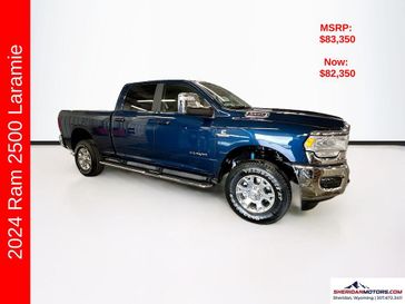 2024 RAM 2500 Laramie Crew Cab 4x4 6'4' Box in a Patriot Blue Pearl Coat exterior color and Blackinterior. Sheridan Motors CDJR 307-218-2217 sheridanmotor.com 