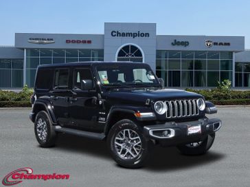 2024 Jeep Wrangler 4-door Sahara in a Black Clear Coat exterior color and CLOTHinterior. Champion Chrysler Jeep Dodge Ram 800-549-1084 pixelmotiondemo.com 