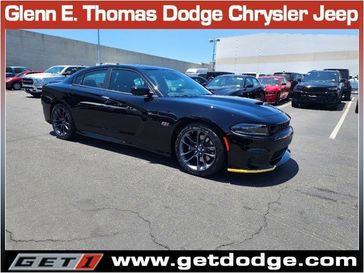 2023 Dodge Charger Scat Pack in a Pitch Black exterior color and Blackinterior. Glenn E Thomas 100 Years Of Excellence (866) 340-5075 getdodge.com 