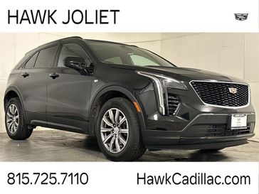 2020 Cadillac XT4 FWD Sport in a Stellar Black Metallic exterior color and Jet Black with Cinnamon accentsinterior. Glenview Luxury Imports 847-904-1233 glenviewluxuryimports.com 