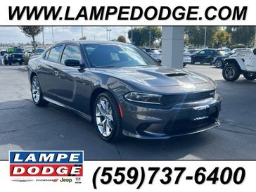 2023 Dodge Charger Gt Rwd in a Granite exterior color and Blackinterior. Lampe Chrysler Dodge Jeep RAM 559-471-3085 pixelmotiondemo.com 