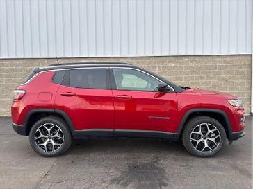 2025 Jeep Compass Limited 4x4 in a Red Hot Pearl Coat exterior color. Wilmington Auto Center Chrysler Dodge Jeep Ram (937) 556-6430 wilmingtonautocentercdjr.com 