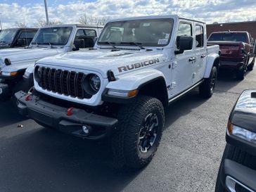 2024 Jeep Gladiator Rubicon X 4x4 in a Bright White Clear Coat exterior color. Gupton Motors Inc 615-384-2886 guptonmotors.com 