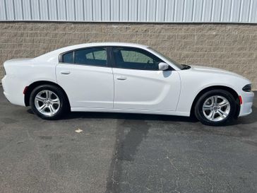 2022 Dodge Charger SXT in a White Knuckle Clear Coat exterior color and Blackinterior. Wilmington Auto Center Chrysler Dodge Jeep Ram (937) 556-6430 wilmingtonautocentercdjr.com 