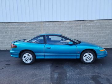 1992 Saturn SC Base in a Teal exterior color. Wilmington Auto Center Chrysler Dodge Jeep Ram (937) 556-6430 wilmingtonautocentercdjr.com 