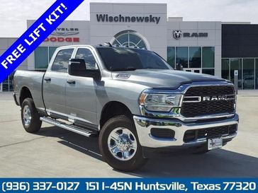 2024 RAM 2500 Tradesman Crew Cab 4x4 6'4' Box in a Billet Silver Metallic Clear Coat exterior color and Blackinterior. Wischnewsky Dodge 936-755-5310 wischnewskydodge.com 
