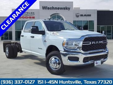 2024 RAM 3500 Slt Crew Cab Chassis 4x4 60' Ca in a Bright White Clear Coat exterior color and Blackinterior. Wischnewsky Dodge 936-755-5310 wischnewskydodge.com 