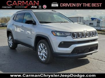 2024 Jeep Compass Latitude Lux 4x4 in a Silver Zynith Metallic Clear Coat exterior color. Carman Chrysler Jeep Dodge Ram 302-317-2378 carmanchryslerjeepdodge.com 