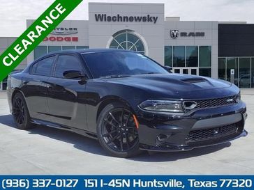 2023 Dodge Charger Scat Pack in a Pitch Black exterior color and Blackinterior. Wischnewsky Dodge 936-755-5310 wischnewskydodge.com 