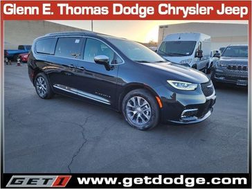 2024 Chrysler Pacifica Plug-in Hybrid Pinnacle in a Brilliant Black Crystal Pearl Coat exterior color and Sepia/Blackinterior. Glenn E Thomas 100 Years Of Excellence (866) 340-5075 getdodge.com 
