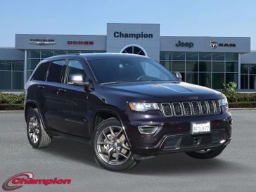 2021 Jeep Grand Cherokee 80th Anniversary in a Sangria Metallic Clear Coat exterior color and Blackinterior. Champion Chrysler Jeep Dodge Ram 800-549-1084 pixelmotiondemo.com 