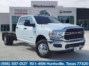 2024 RAM 3500 Slt Crew Cab Chassis 4x4 60' Ca in a Bright White Clear Coat exterior color and Blackinterior. Wischnewsky Dodge 936-755-5310 wischnewskydodge.com 