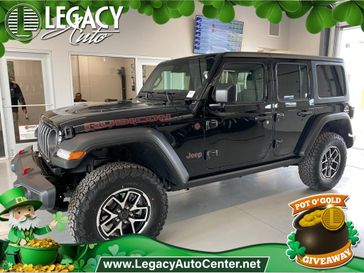 2024 Jeep Wrangler 4-door Rubicon in a Black Clear Coat exterior color and Blackinterior. Legacy Auto Center 620-315-9264 legacyautocenter.net 