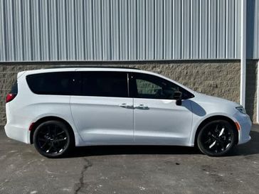 2024 Chrysler Pacifica Touring L in a Bright White Clear Coat exterior color and Blackinterior. Wilmington Auto Center Chrysler Dodge Jeep Ram (937) 556-6430 wilmingtonautocentercdjr.com 