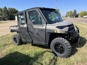 2024 Polaris Ranger Crew XP 1000 NorthStar Edition Ultimate in a Sand exterior color. Mettler Implement mettlerimplement.com 