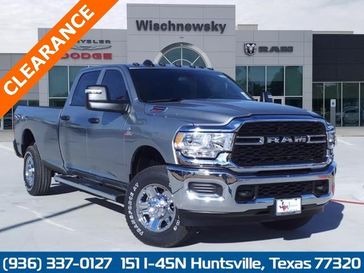 2024 RAM 2500 Tradesman Crew Cab 4x4 8' Box in a Billet Silver Metallic Clear Coat exterior color and Blackinterior. Wischnewsky Dodge 936-755-5310 wischnewskydodge.com 